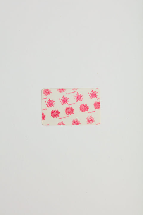 A prink floral printed gift card.