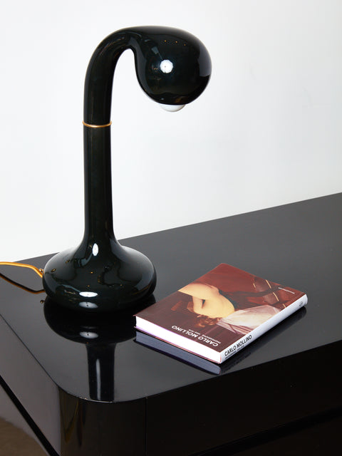 Black Ceramic Table Lamp by Entler Studio on a black surface.