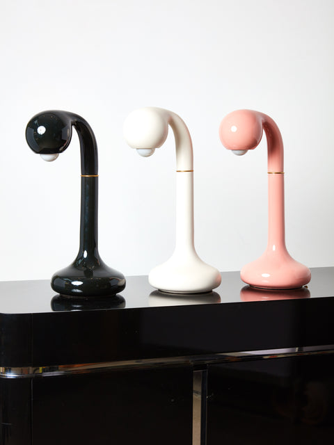 Black, white, and pink ceramic table lamps by Entler Studio in a row.