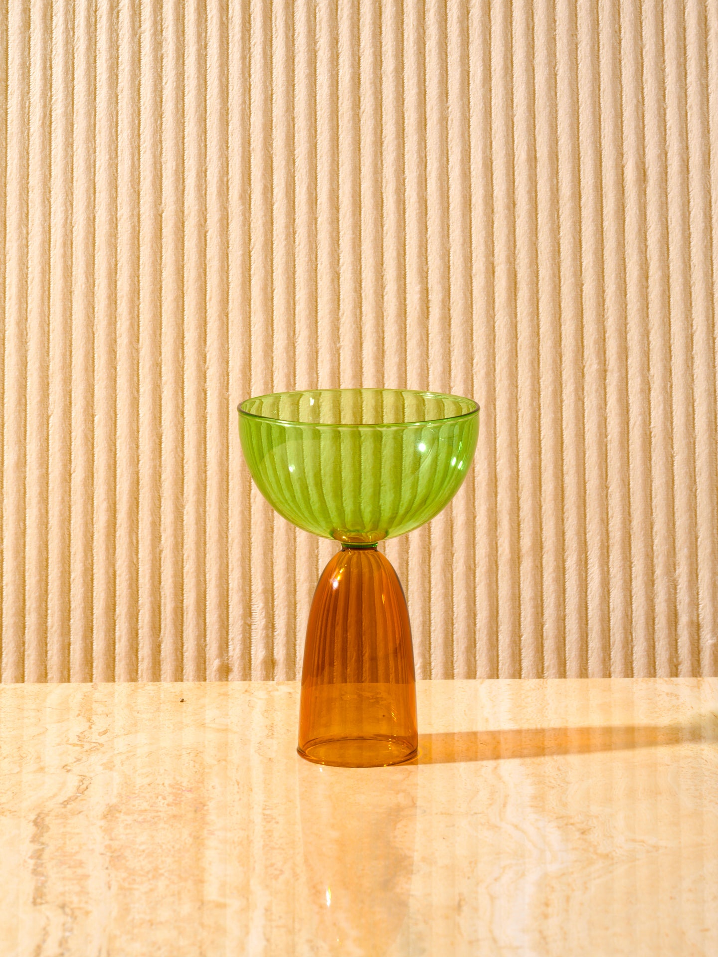 A single green top, amber bottom Coco Coupe.