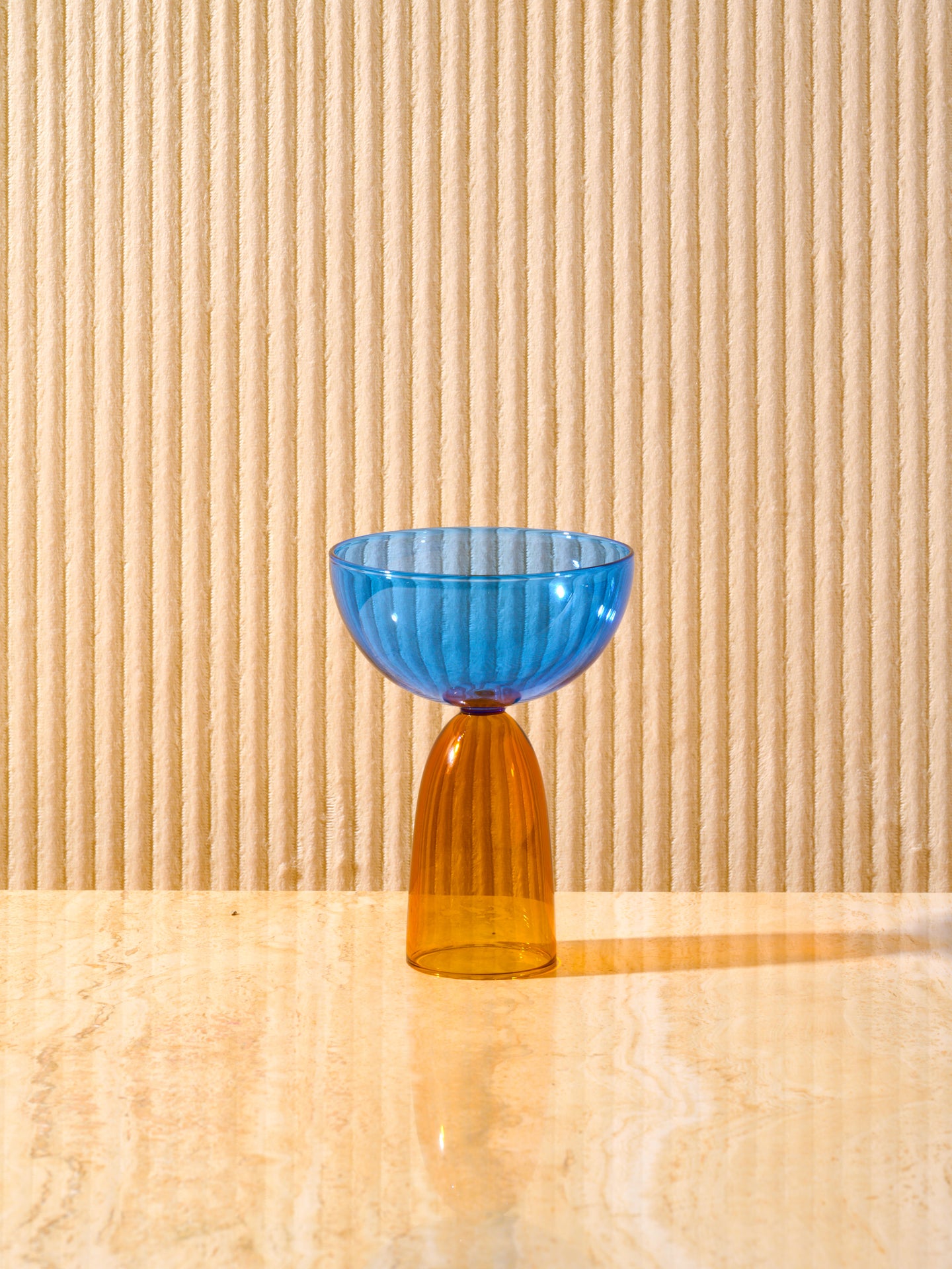 A single blue top, amber bottom Coco Coupe.