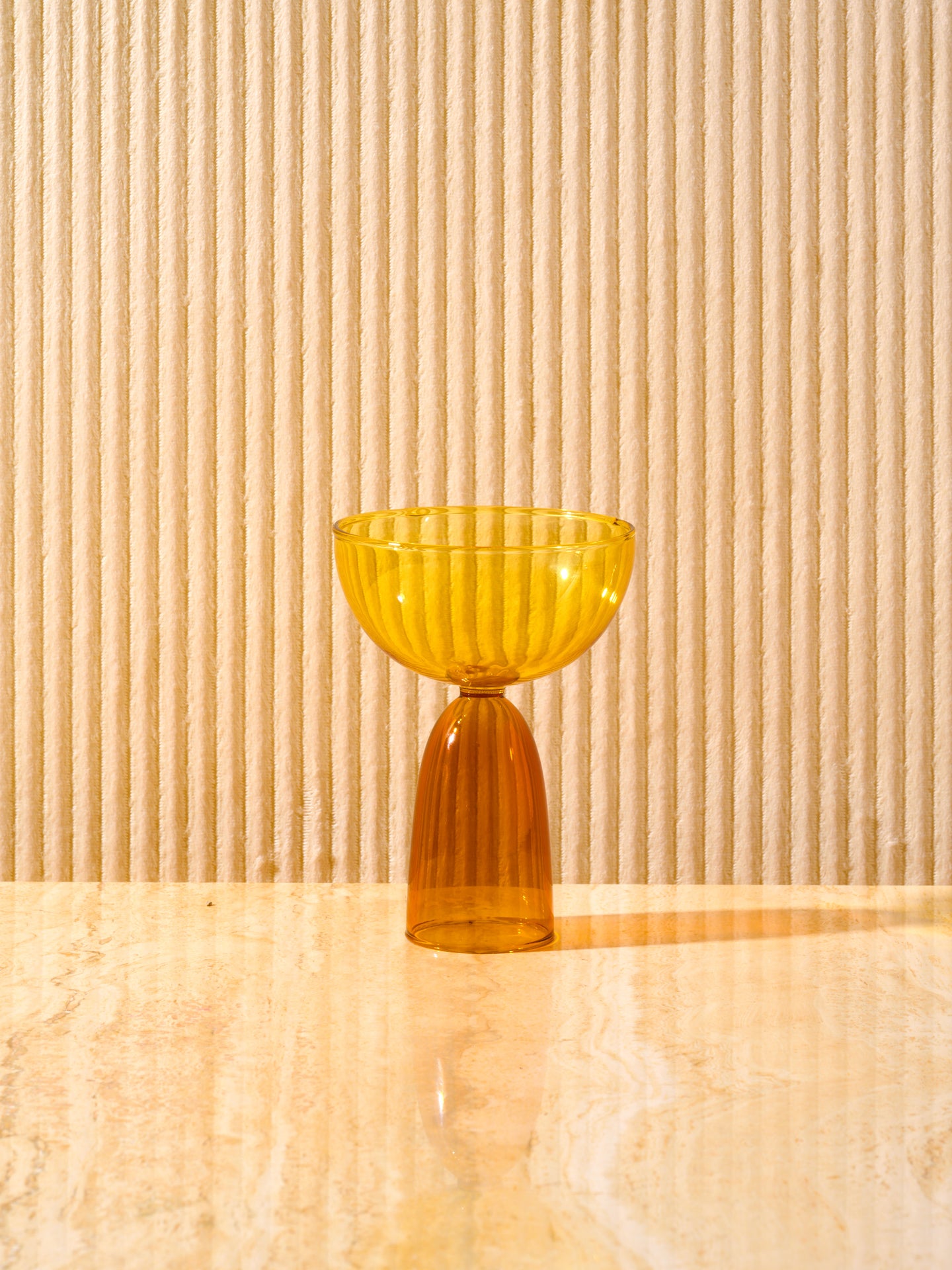 A single honey top, amber bottom Coco Coupe.