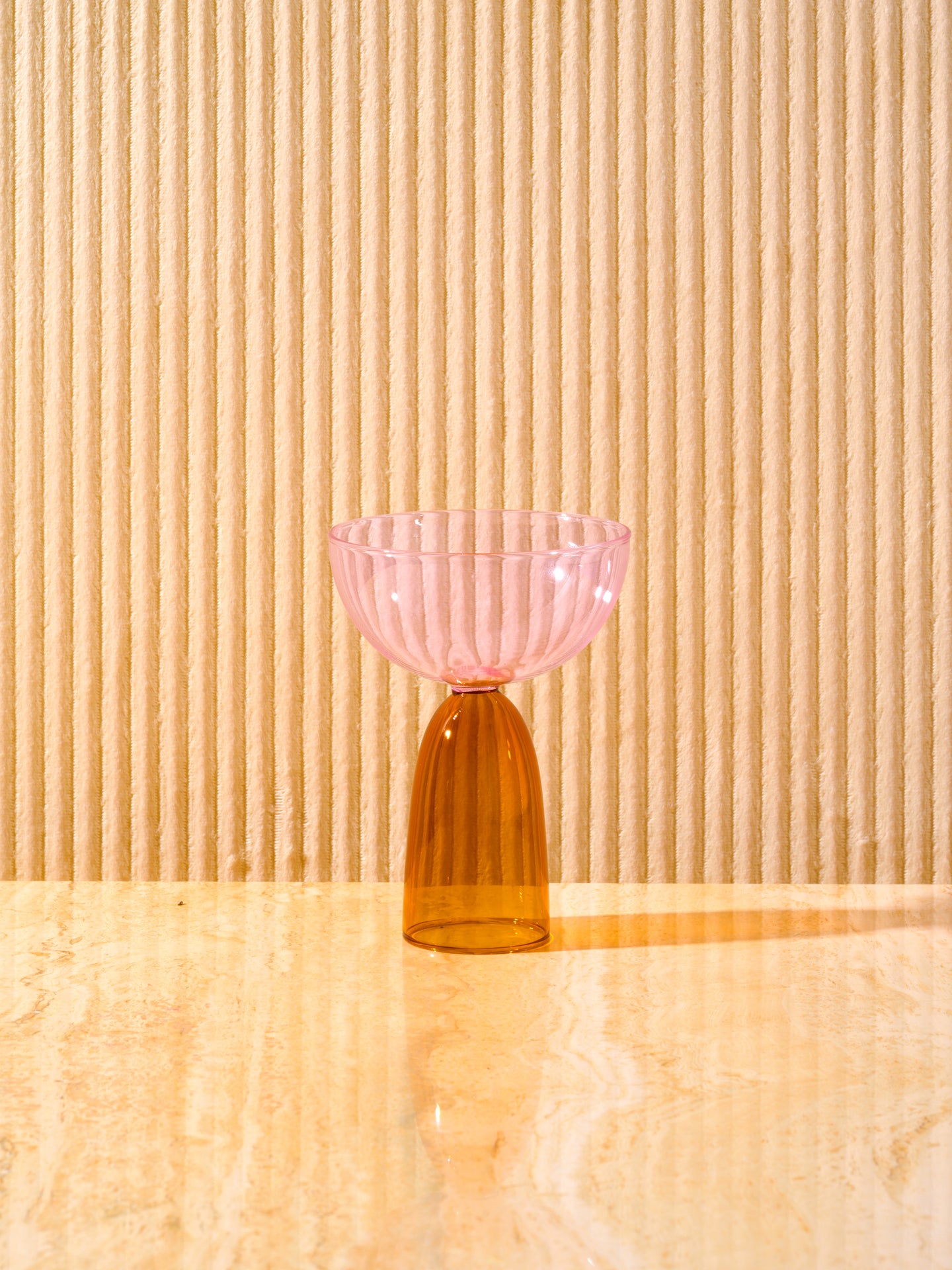 A single pink top, amber bottom Coco Coupe.