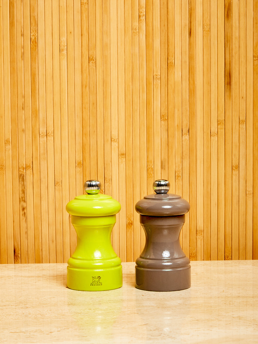 One lime and one grey Salt and Pepper Mill by Peugeot.