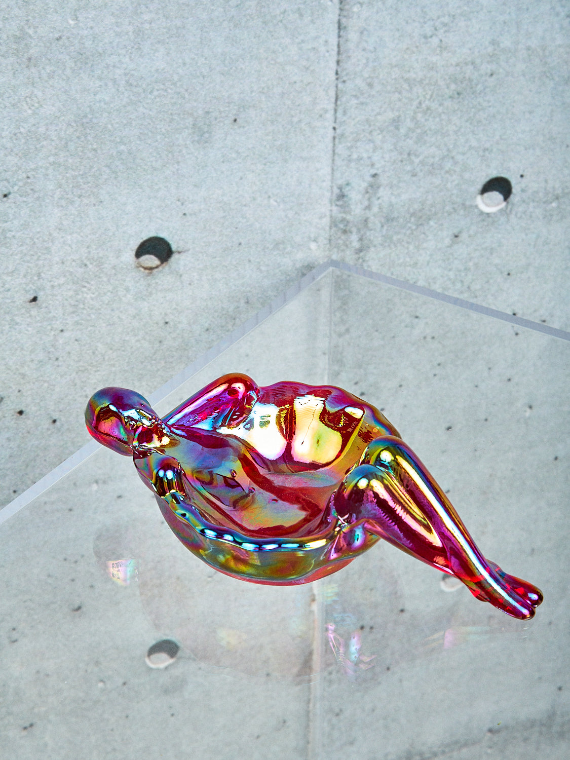 A red iridescent bathing lady.