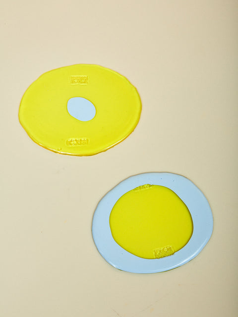 A pair of yellow and pastel blue Table-Mates.