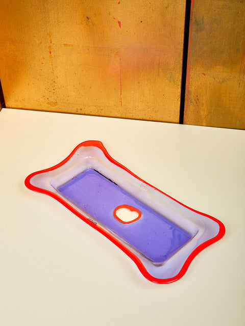 A rectangular lilac and red orange resin tray.