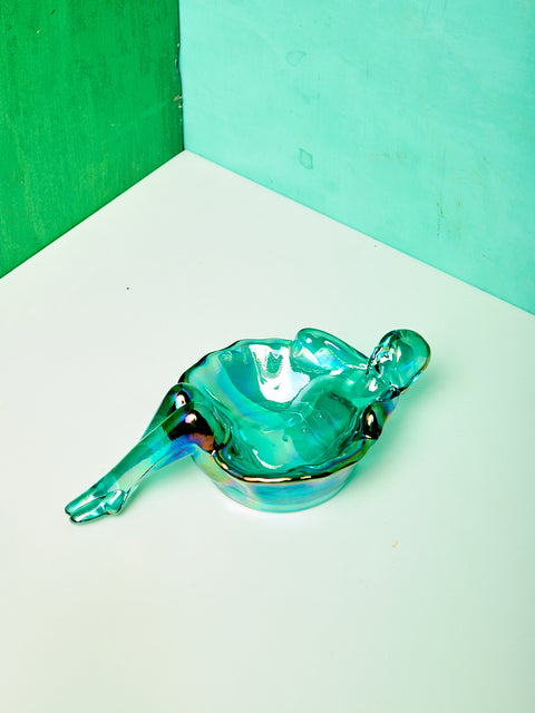 A teal iridescent bathing lady.