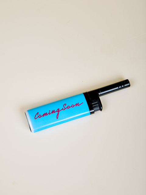 Bic EZ Reach lighter in blue with the Coming Soon logo.