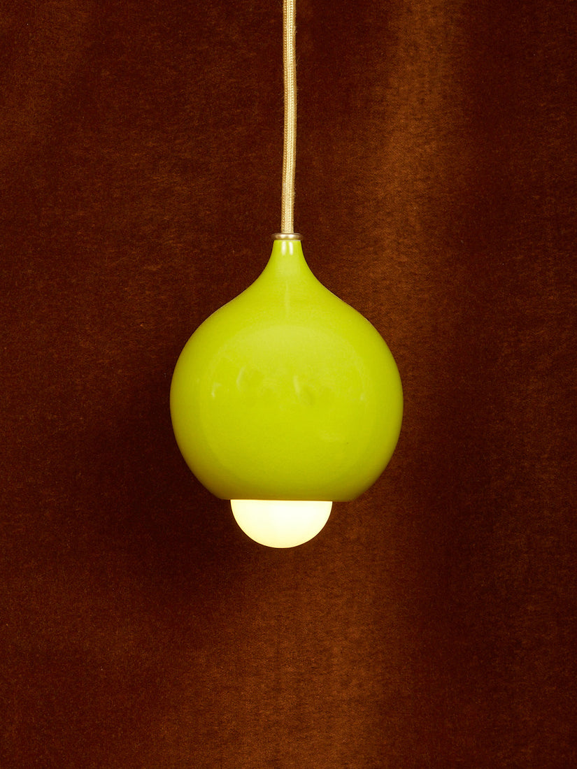 A gloss chartreuse droplet pendant.