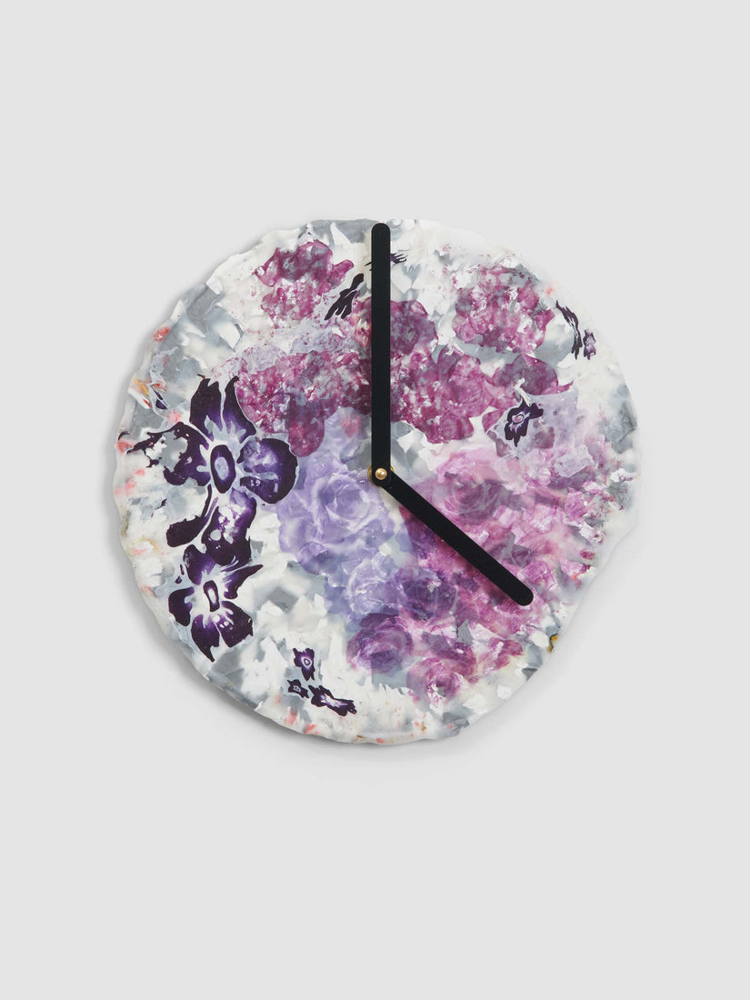Thank You Clock by Chen Chen and Kai Williams. Composed of plastic bags in floral design.