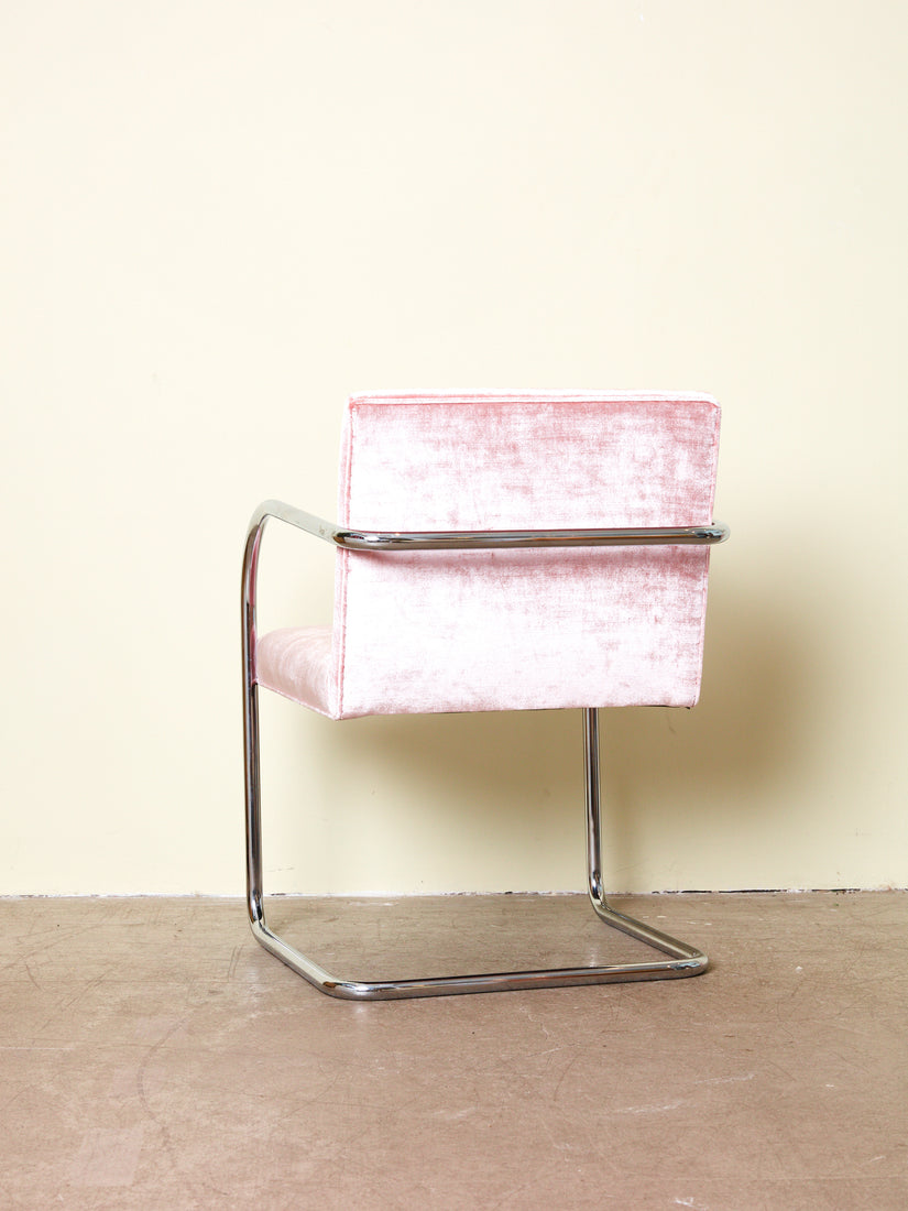 The back of a Pink Velvet Brno Chair.