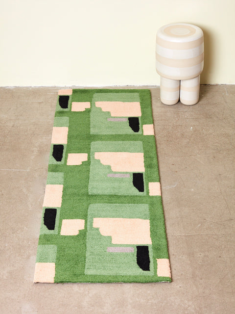 Purple Noon runner rug by Cold Picnic next to a Workaday Handmade milking stool.