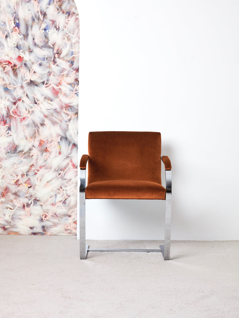 Brno Flat Bar Chair designed by Mies van der Rohe.