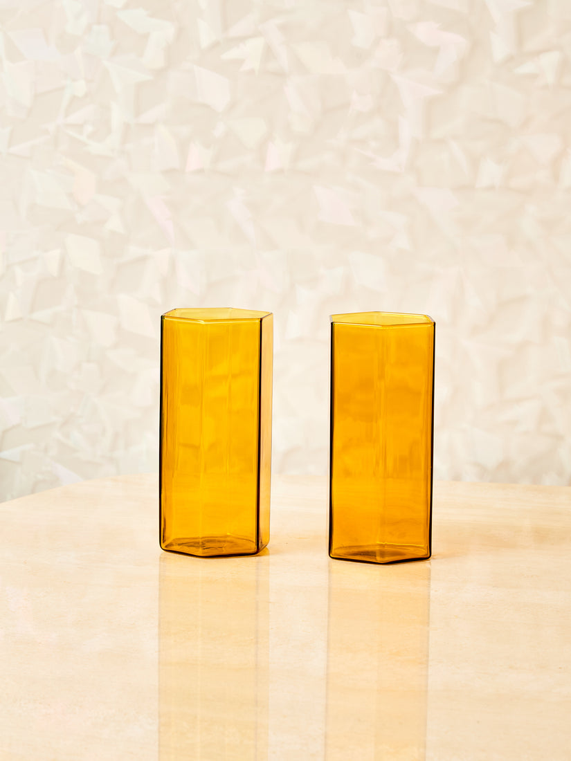 A pair of honey Coucou Glasses by Maison Balzac.