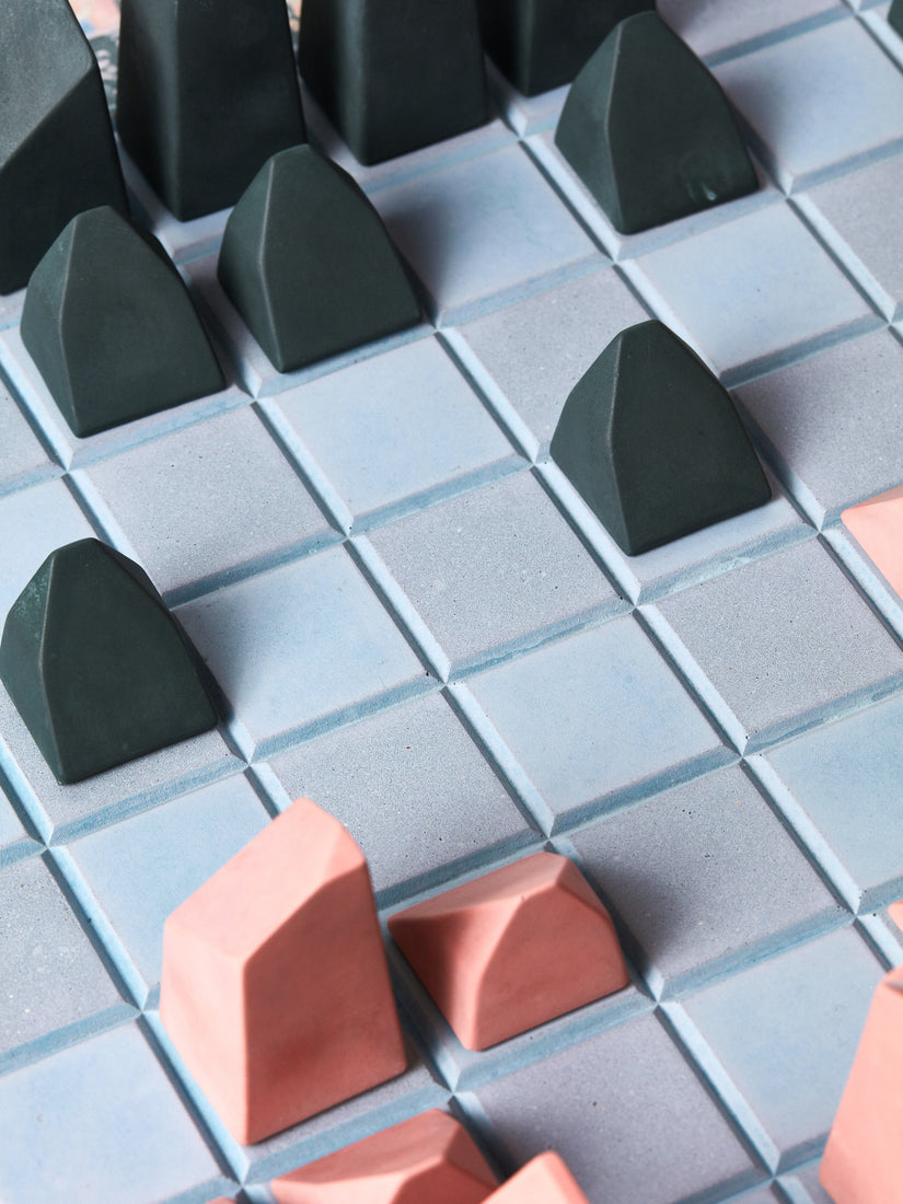 Close up of the Concrete game pieces.