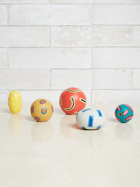 A set of 5 round patterned wall hooks by Chiaozza.