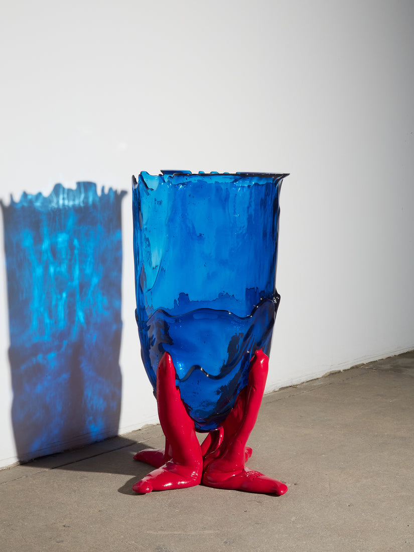 XXL Vessel by Gaetano Pesce for fish design with a transparent blue body and vibrant opaque red legs.