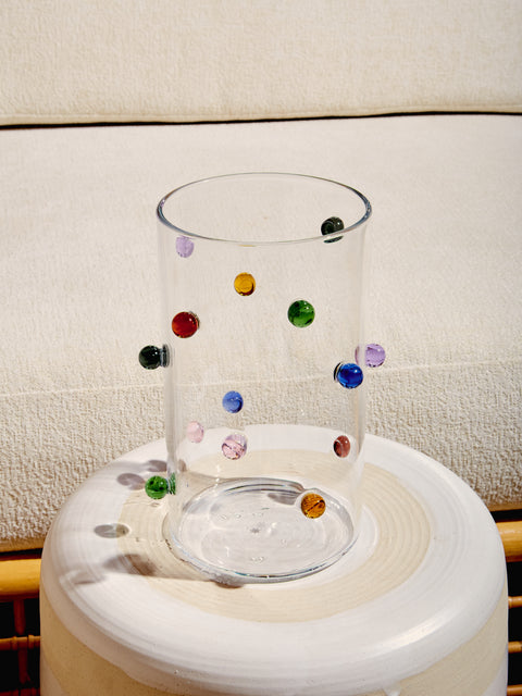 Dot Vase by Maison Balzac resting on a Milking Stool by Workaday Handmade.