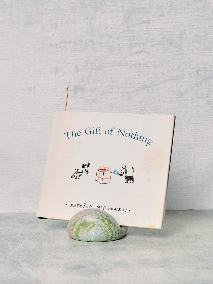The Gift of Nothing book inside a green Bloop Stand.