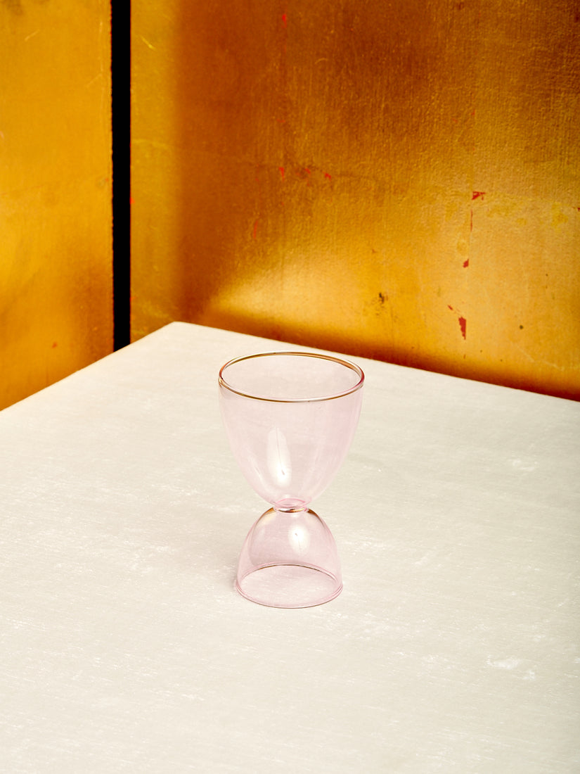 A pink cocktail glass.