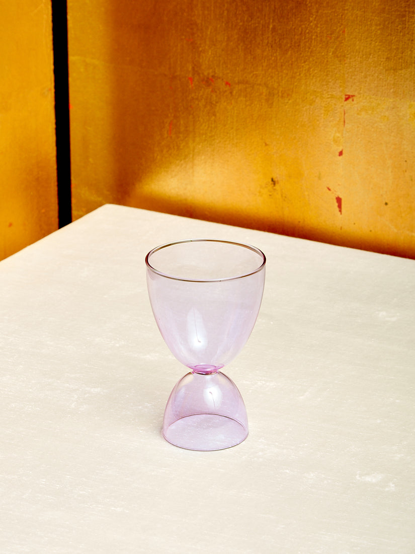 A lavender cocktail glass.