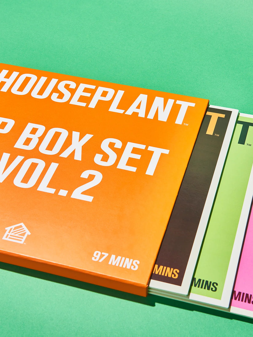 The Houseplant Vinyl Box Set Vol 2 with it's three vinyl sleeves pulled out at different lengths to highlight each covers different color.