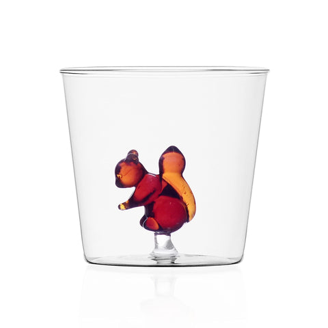 A small cup with a brown squirrel made of glass.