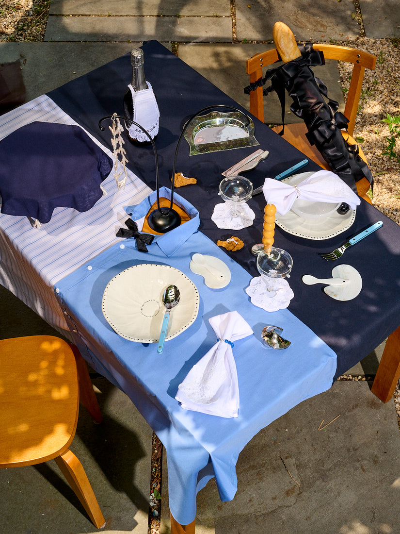 A dining table full of Gohar World accessories.