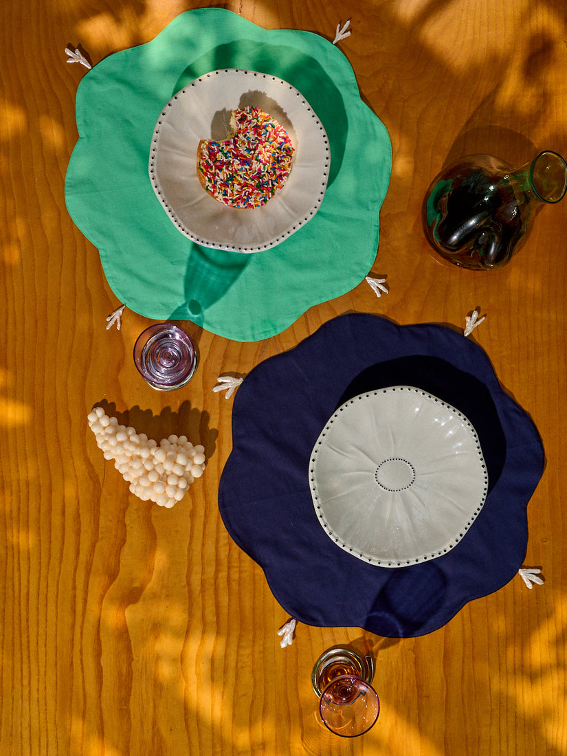 Plate Covers by Gohar World in use as placemats under Poppy Bowls.