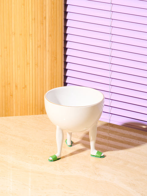 Leg Bowl by Chen Chen and Kai Williams with green slide slippers.