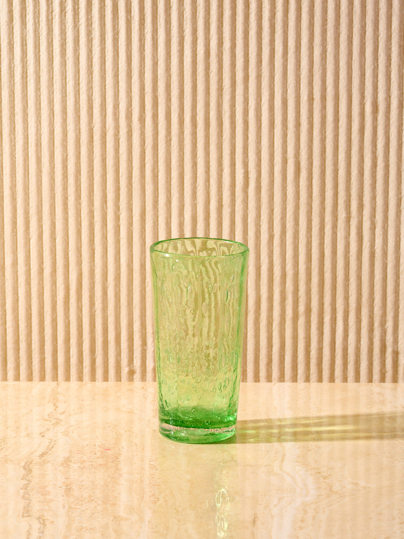 The Orangeade Glass in Green by La Romaine Editions.