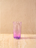 The Orangeade Glass in Purple by La Romaine Editions.