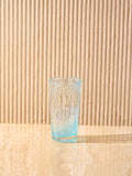 The Orangeade Glass in Blue by La Romaine Editions.