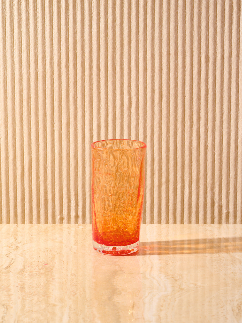 The Orangeade Glass in Orange by La Romaine Editions.