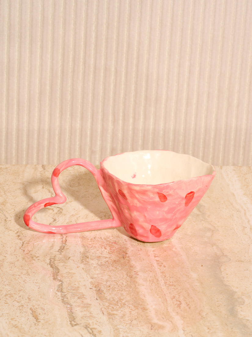 Pink Ceramic Heart Mug by La Romaine Editions with a hand-formed heart handle.