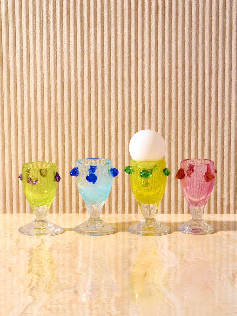 The Egg Cup by La Romaine Editions, from left to right: Green/Purple, Blue/Blue, Yellow/Green, Pink/Red