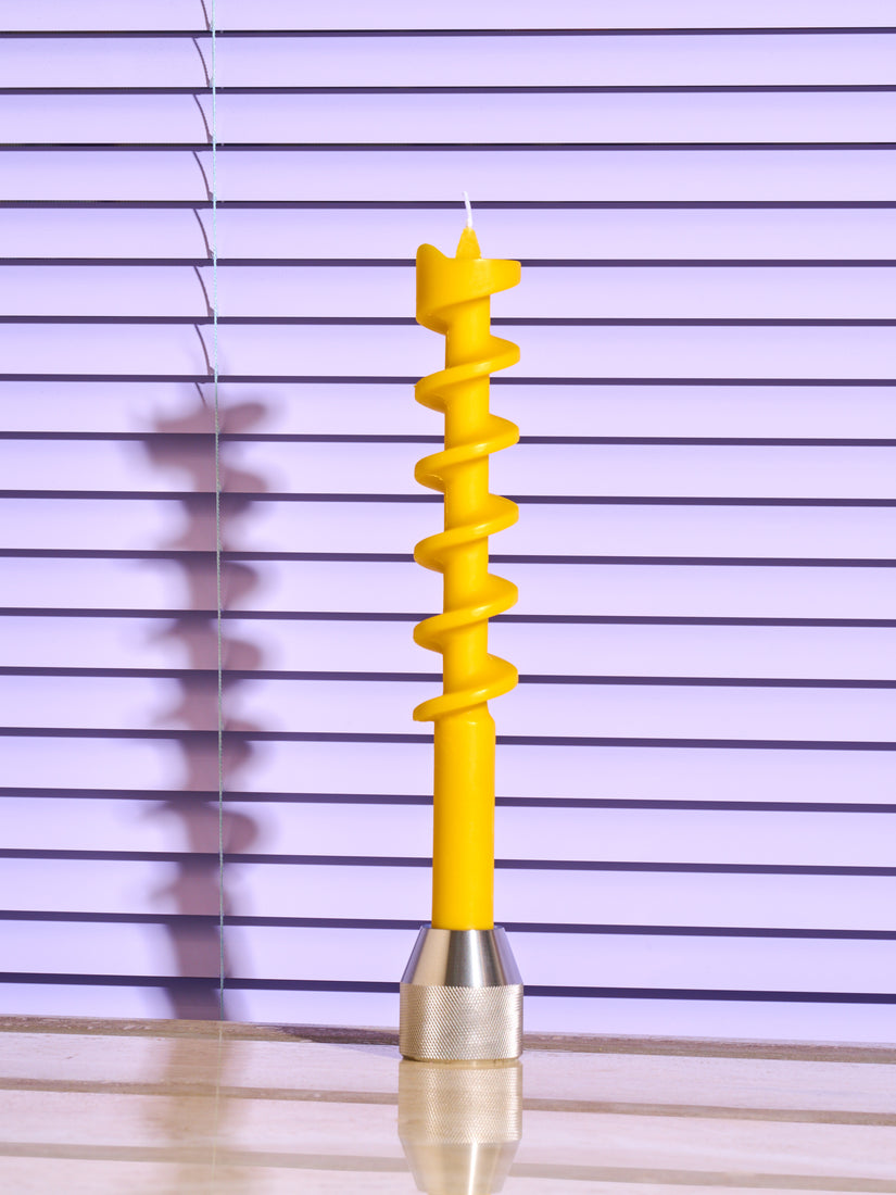 Yellow Drill Bit Candle in Drill Bit Candle Holder by 54 Celcius.