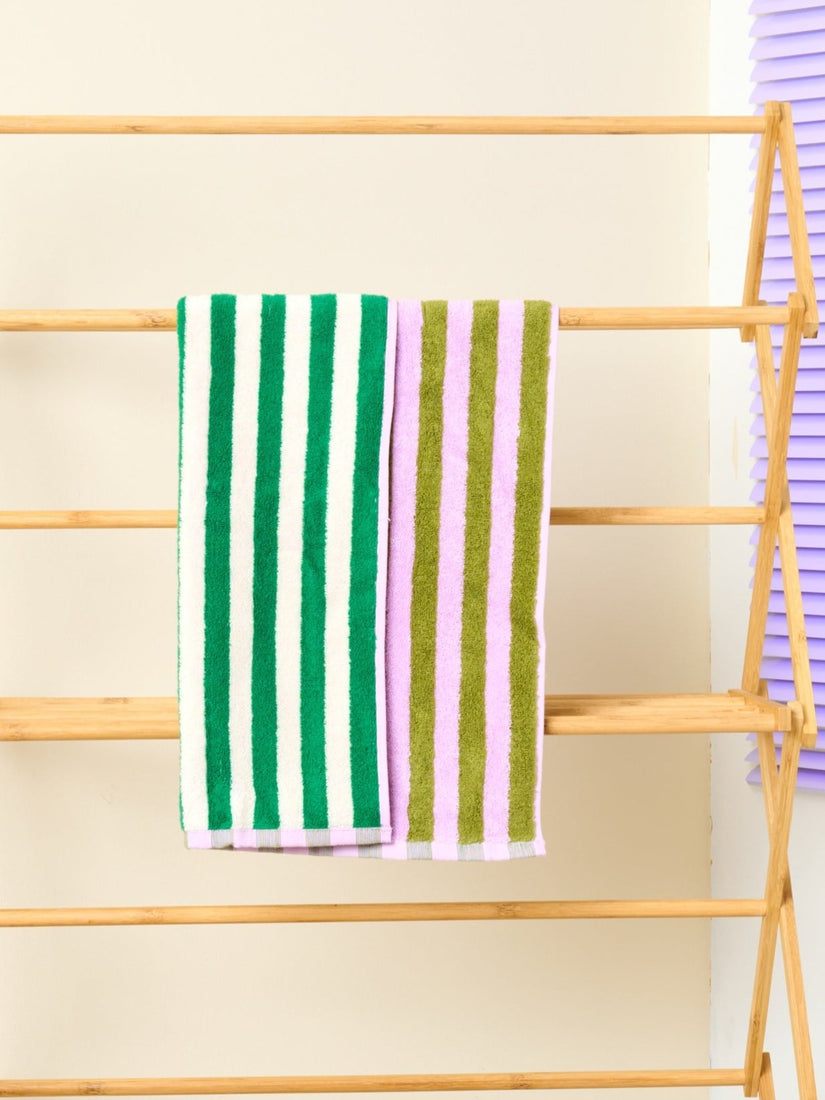 Sea Hand Towel by Dusen Dusen with olive and lavender stripes on one side, green and white on the other.