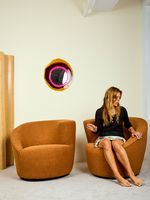 Pair of Nautilus Swivel Chairs