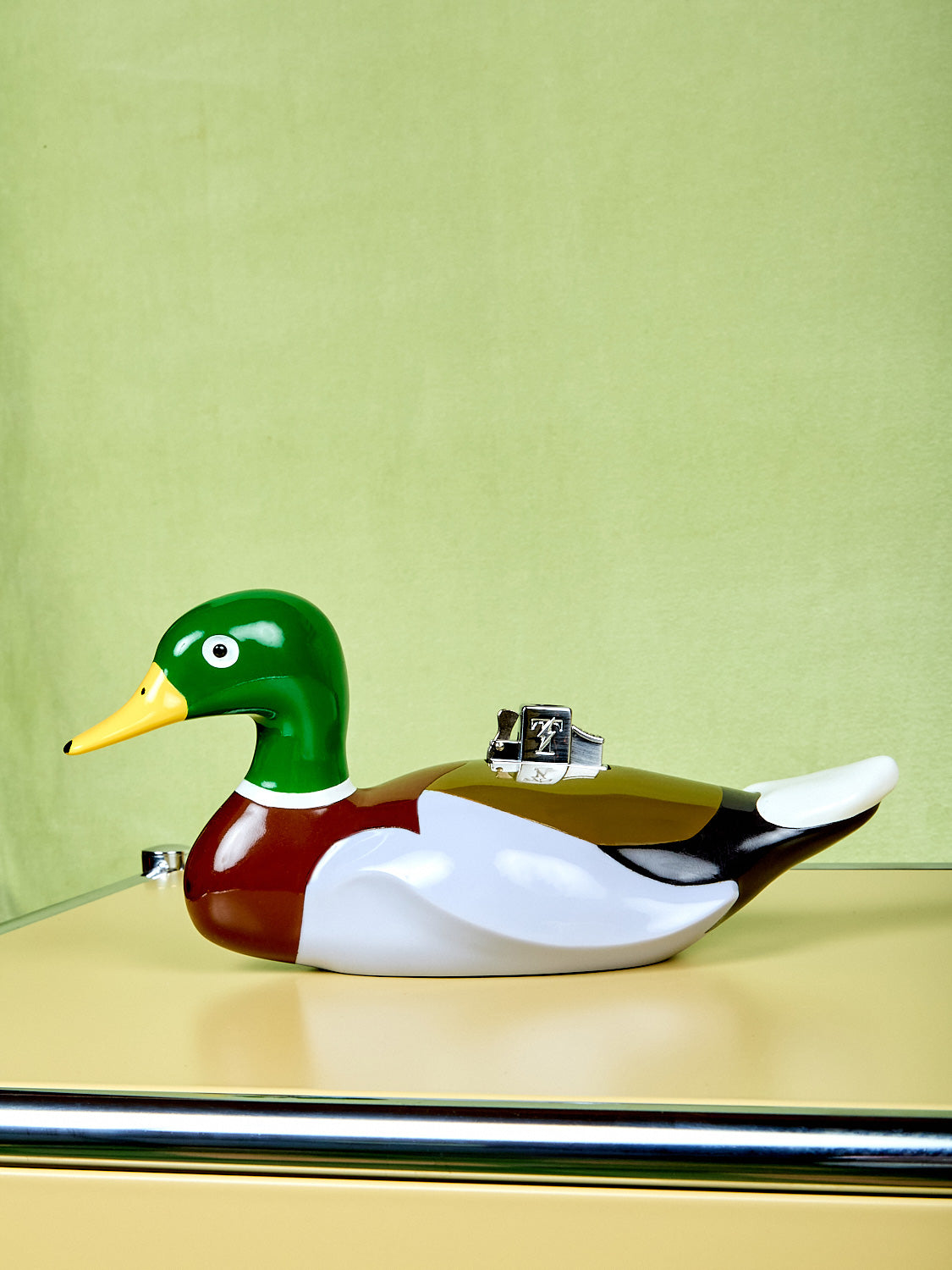 Hand-painted Mallard Duck shaped lighter from Edie Parker.