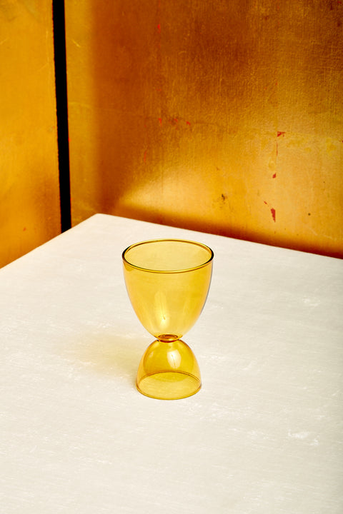 A single honey Cocktail Glass by Mamo.