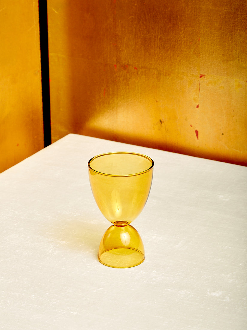 A single honey Cocktail Glass by Mamo.