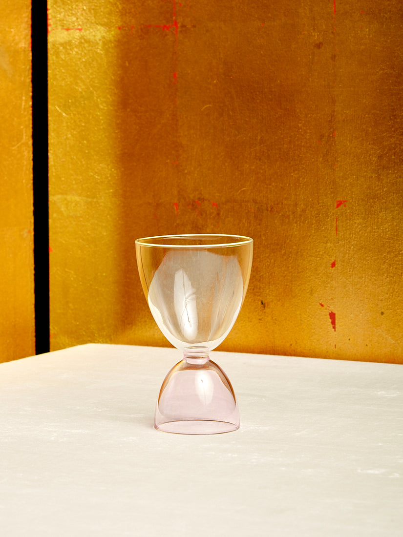 A single clear top pink bottom Cocktail Glass by Mamo.