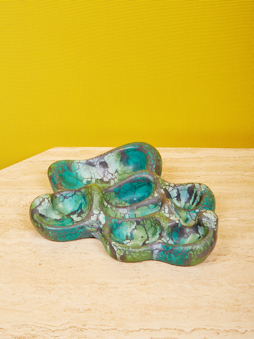 The Aphrodite Trinket Tray by Concrete Cat in the green and charcoal colorway.
