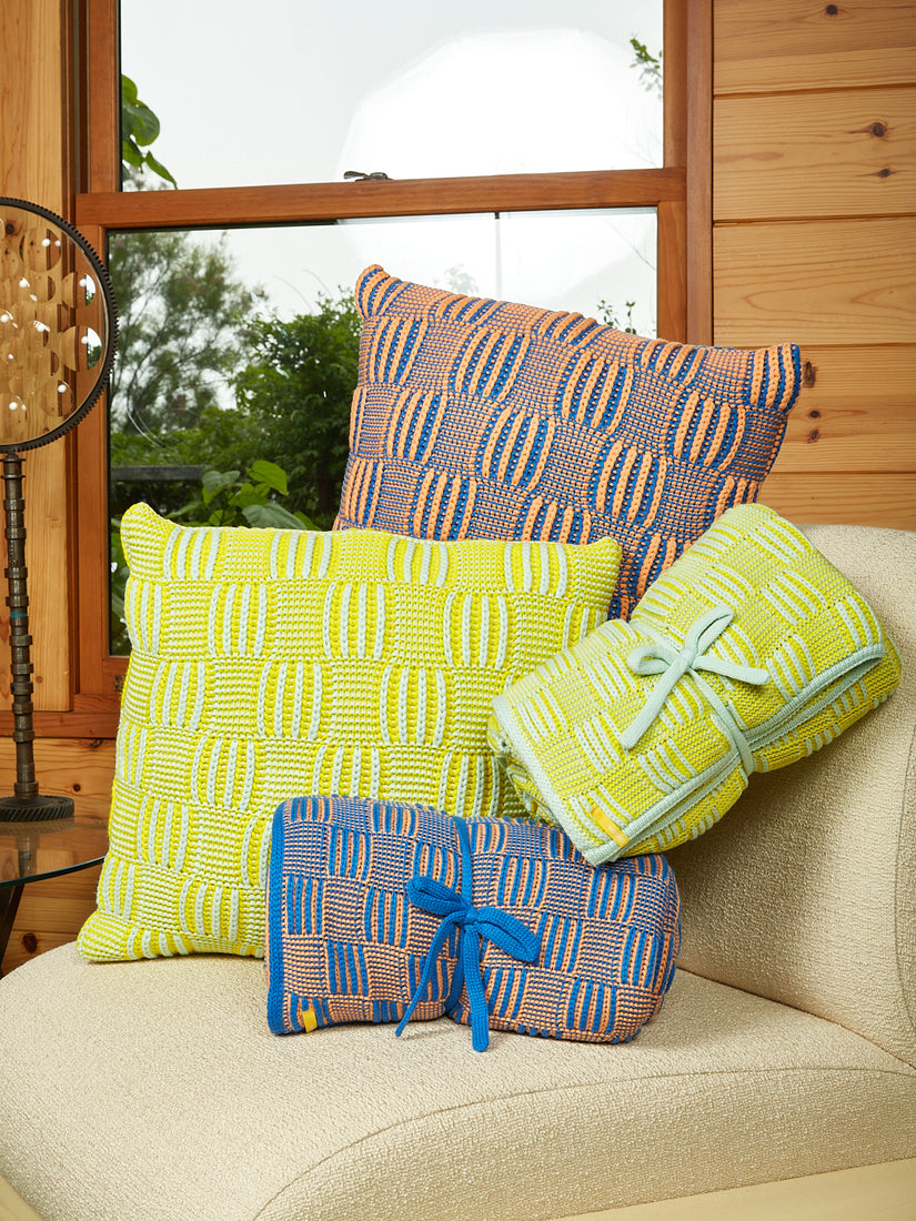 Chunky Checkerboard Pillows and throw blankets by verloop in two matching colorways.