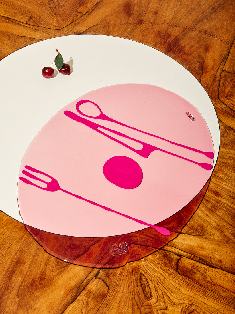 A fuchsia and pink Table-Mate placemat.