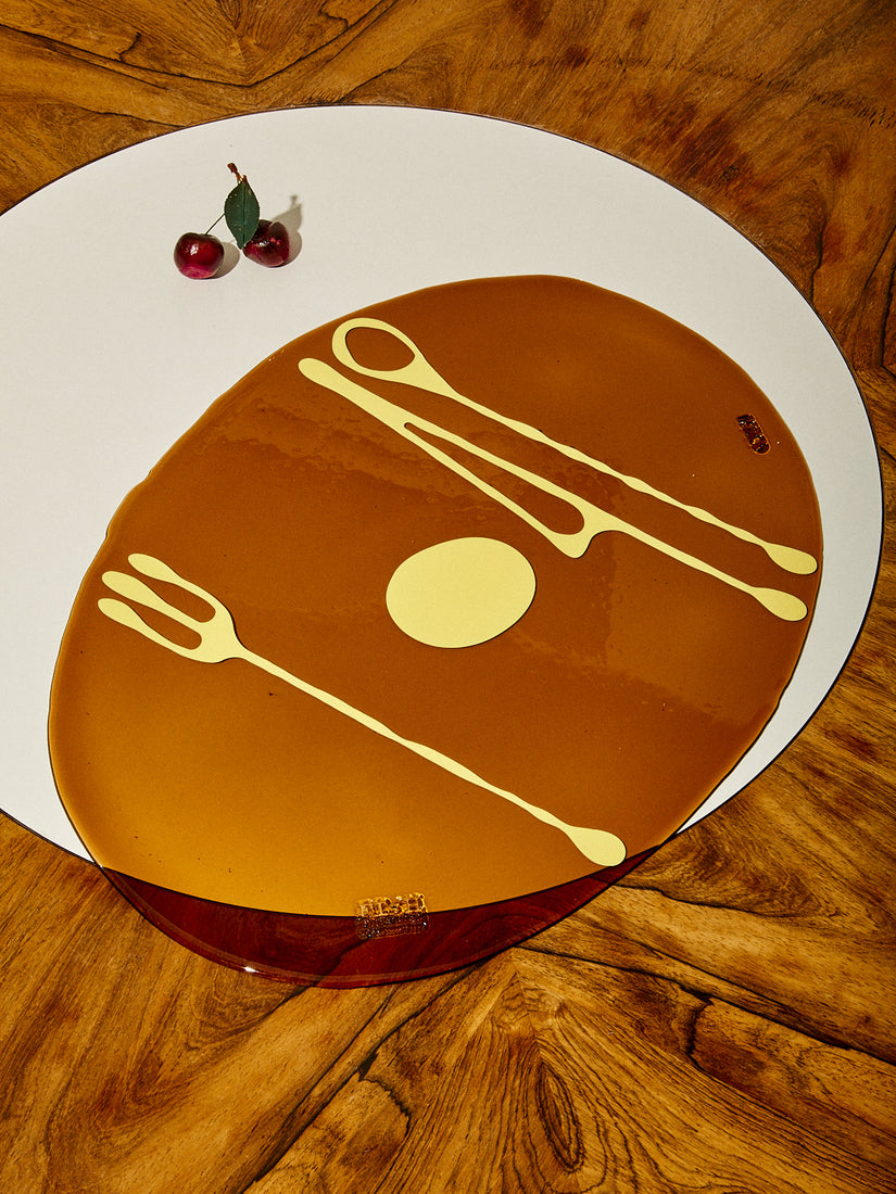 A brown and butter Table-Mates placemat.