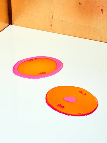 A pair of Orange and Fuchsia Table-Mates.