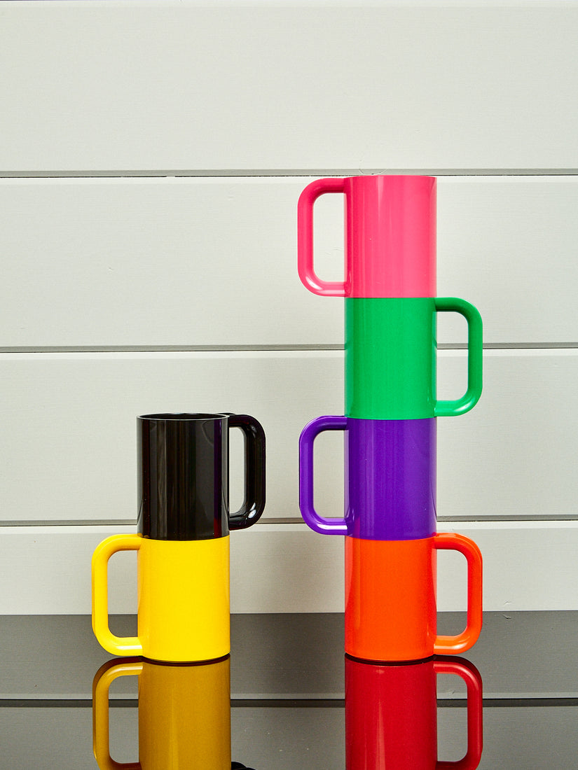 Six Max Mugs by Heller in different colors.
